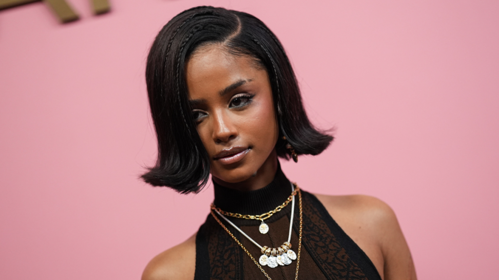 Tyla Commands Courtside Attention in Lacy Rowen Rose Bodysuit