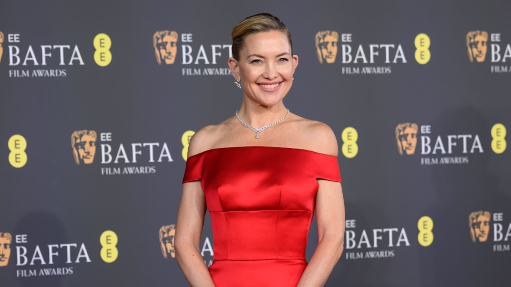 Kate Hudson Steals BAFTAs Spotlight in Bold Red Prada