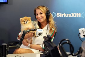 Jill Zarin at SiriusXM Studios, wearing headphones and holding her dog