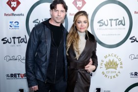 Aaron Phypers with his arm around Denise Richards