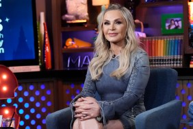 Tamra Judge in a denim dress, sitting with her legs crossed on Watch What Happens Live