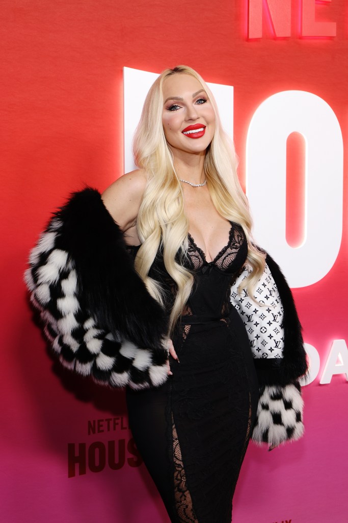 Christine Quinn in a black dress and fur coat at Netflix House Dallas 