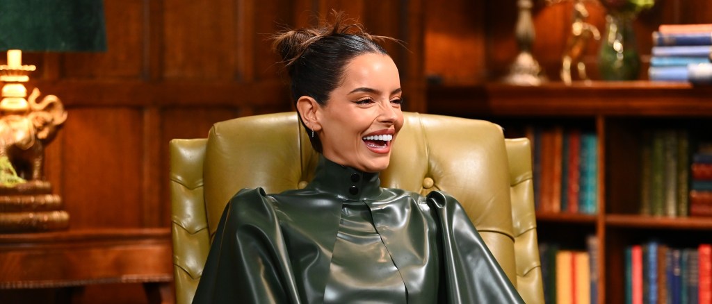 Maura Higgins grinning in an interview on The Traitors Season 4