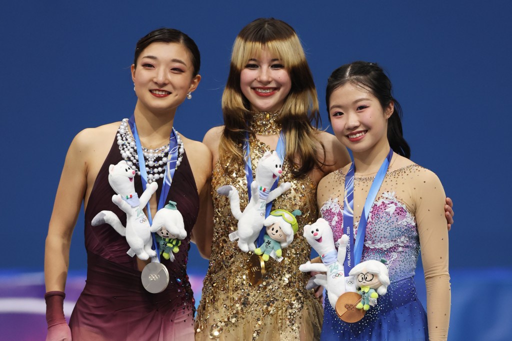 Alysa Liu of Team United States, silver medalist Kaori Sakamoto of Team Japan and bronze medalist Ami Nakai of Team Japan