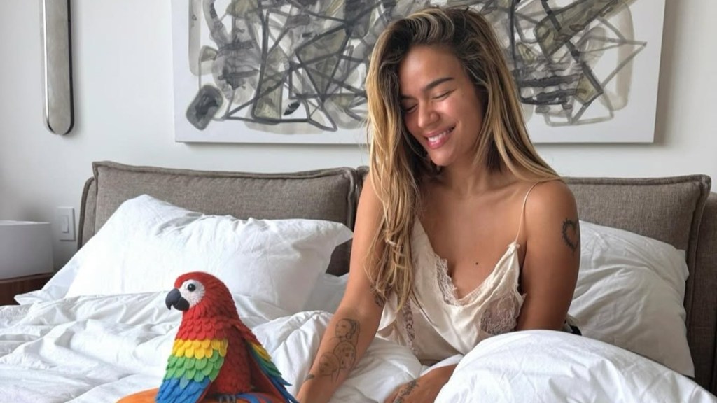 Karol G Keeps All Eyes on Her in Daring Lacy Top Following Grammy Run