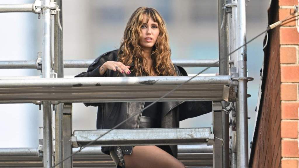 Miley Cyrus Wows in Lacy Cami Top Hanging on by Strings for Maybelline