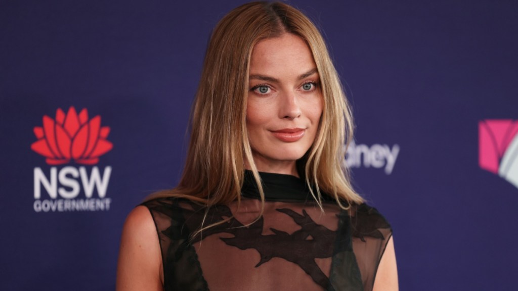 Margot Robbie Keeps It Edgy but Romantic in Roberto Cavalli Corset & Jeans