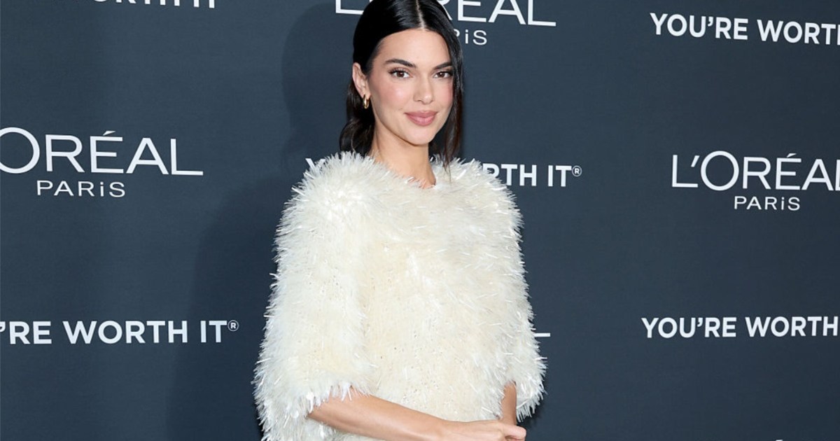 Kendall Jenner Pairs Fully Sheer Tights With a Sweater for Vogue France