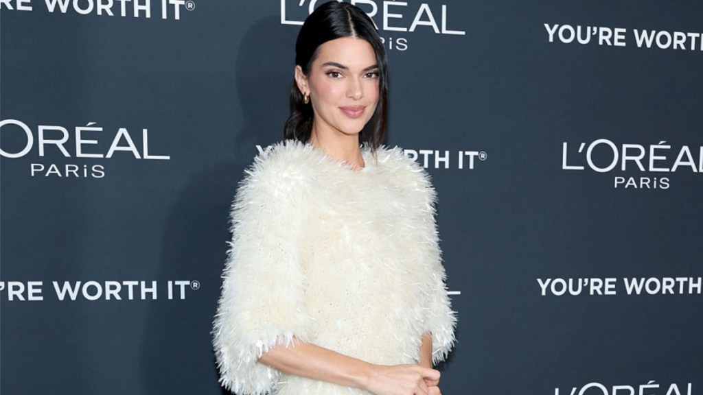 Kendall Jenner Pairs Fully Sheer Tights With a Sweater for Vogue France