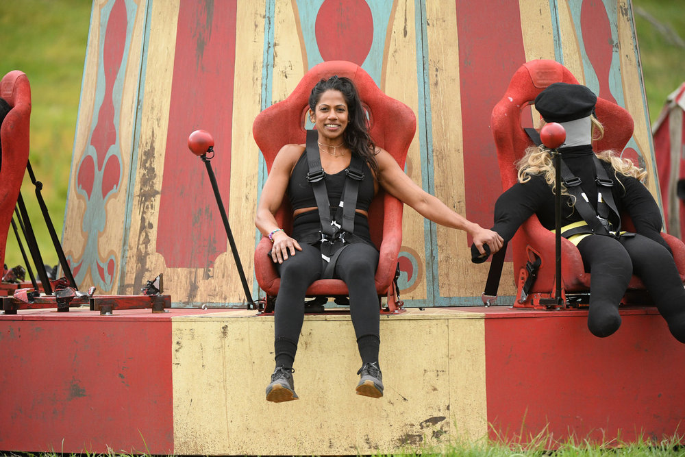 Natalie Anderson strapped up to a carousel on The Traitors Season 4 Episode 10 