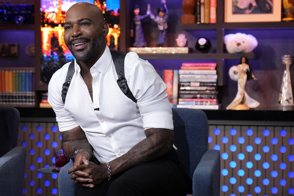 Karamo Brown in a white button-up shirt on Watch What Happens Live