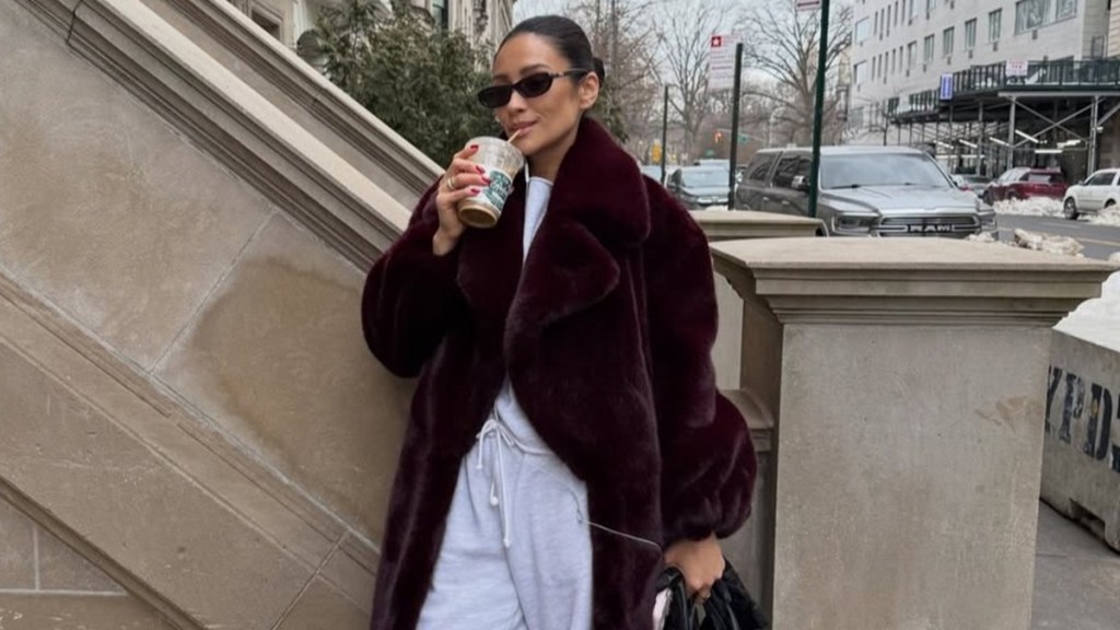 Shay Mitchell Debuts Cozy-Chic Fur Coat After Capital One Travel Deal
