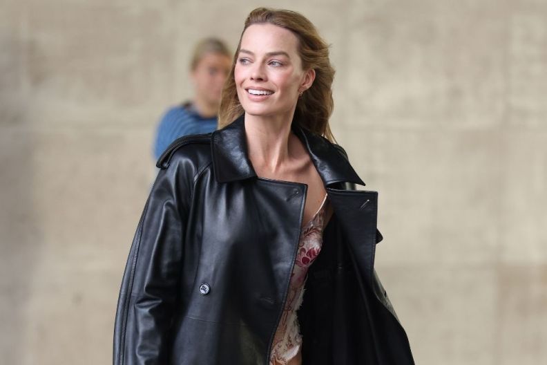 Margot Robbie Dons Burberry Trench Over Corset With Bold Neck
