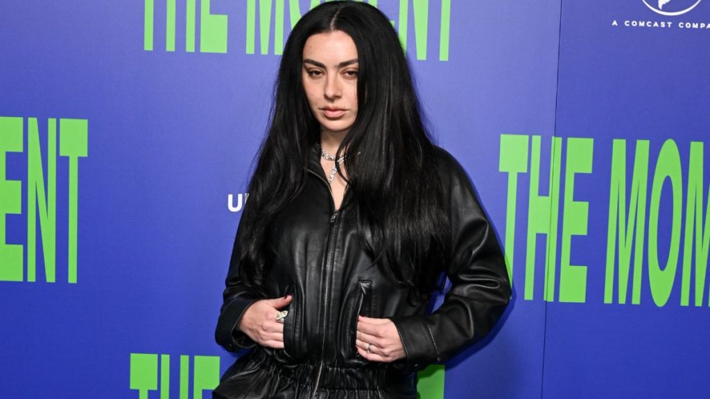 Charli XCX Wears August Barron Leather Jacket as Micro Minidress