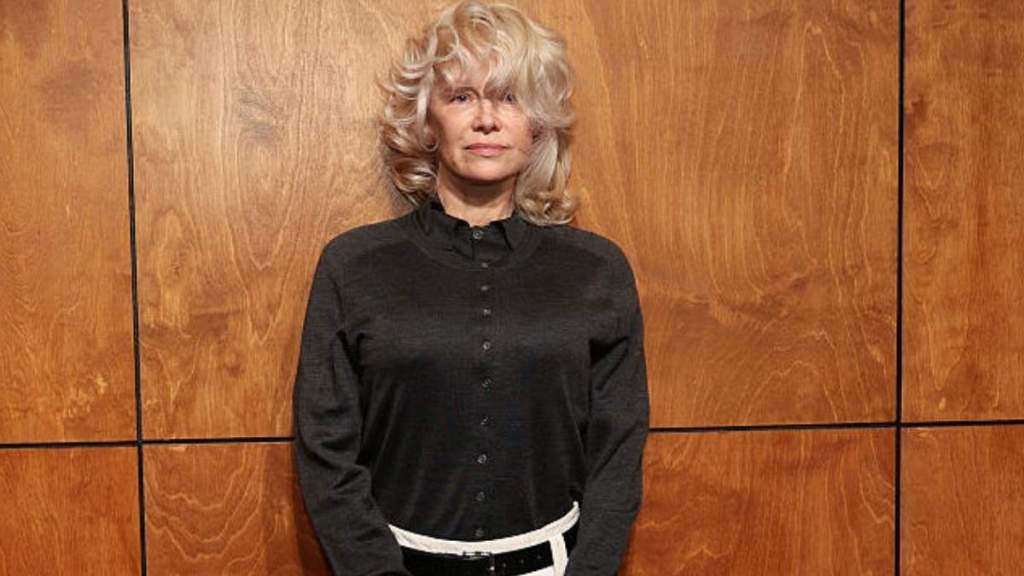 Pamela Anderson Debuts Blonde Wavy Bangs at Tory Burch Show for NYFW