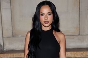 Becky G attended Cult Gaia's fashion show at New York Fashion Week, wearing a spectacular black dress with a fiery side slit.