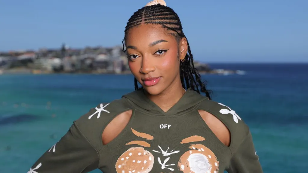 Angel Reese Nails Mob Wife Chic in Roberto Cavalli Dress Held up by Strings