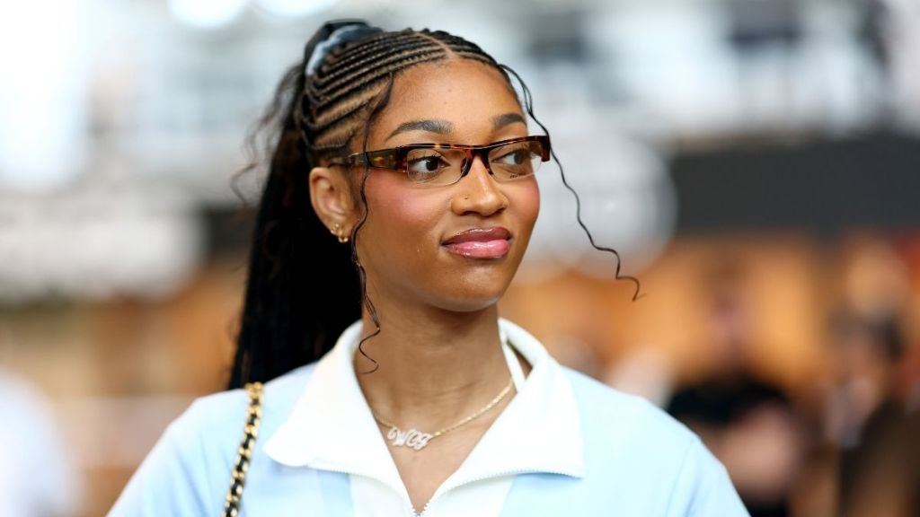 Angel Reese’s Micro Miniskirt Serves Tennis With Luxe Chanel Handbag