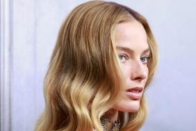 Margot Robbie Turns Heads in Sheer Skull-Print Dress at Vogue Event