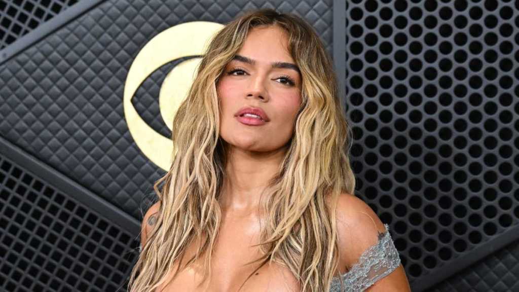 Karol G’s Fully Sheer Ema Savahl Top Has English Garden Artwork on It