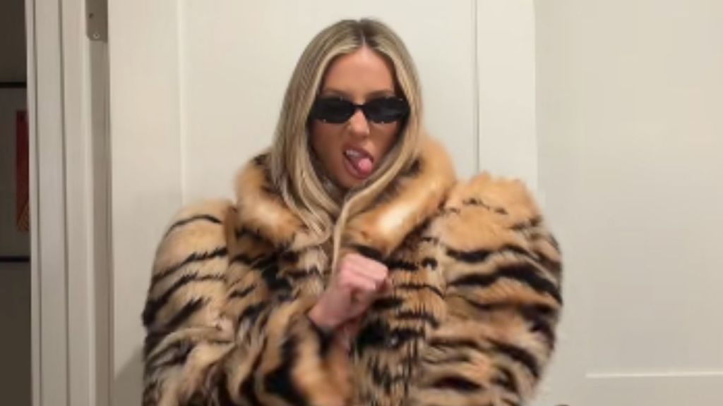 Alix Earle Wears Huge Gucci Fur Coat as Micro Minidress & Chain as Belt