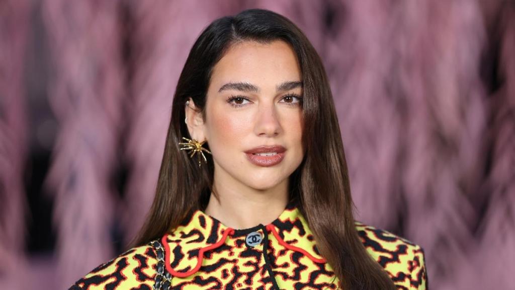 Dua Lipa Dominates Paris in Gucci Tiger Print Faux Fur Coat
