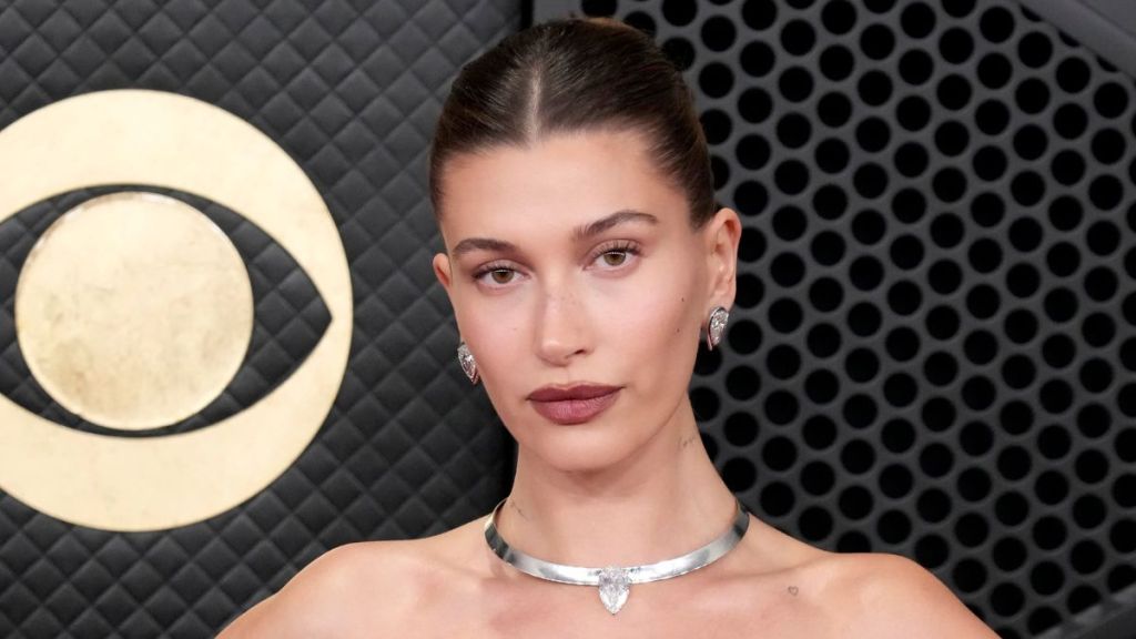 Hailey Bieber Launches Rhode in Australia in Shirt Held by a Button