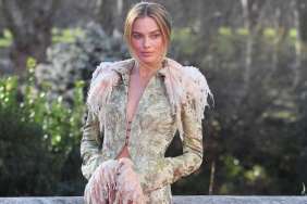 Margot Robbie Layers Miniskirt & Sheer Tights Under Bold John Galliano Coat