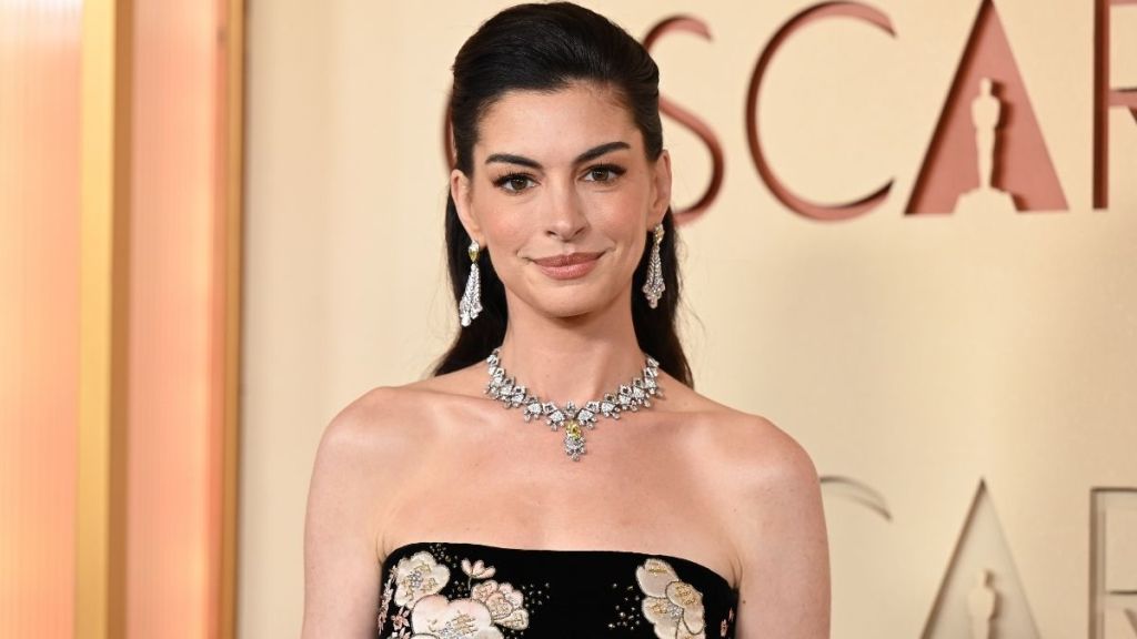 Anne Hathaway Takes the Mob Wife Route in Chic Michael Kors Coat