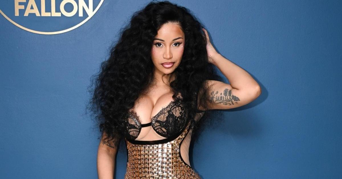 Cardi B's Fitted Dress Has Too Many Cutouts for Podcast Appearance
