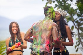 Alexandra Stewart spraying paint on Yamen Sanders who is kissing Alana Morrison on Love Island Season 1