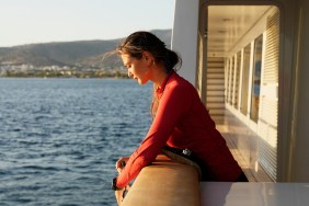 Gael Cameron looking off of the side of a boat