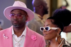 Dr. Eugene Harris in a pink suit and Toya Bush Harris in sunglasses on Married to Medicine Season 12