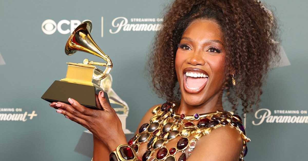 Doechii Poses in Fully See-Through Bikini Top for Photos…