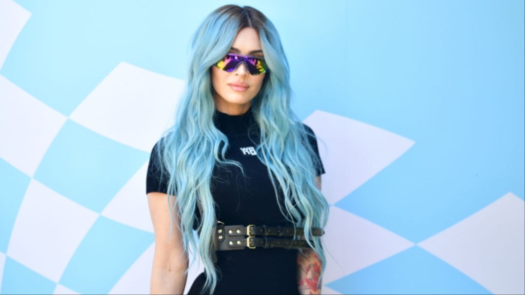 Megan Fox Returns to Instagram in Bold Corset Top & Sheer Tights Look