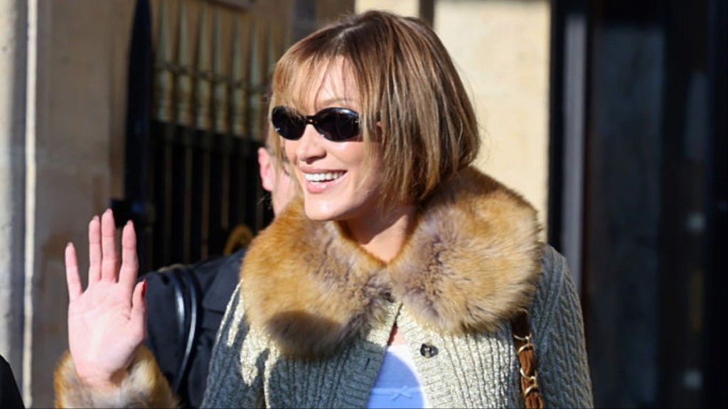 Bella Hadid Arrives in All-Sheer Bodysuit & Skirt Ensemble for YSL