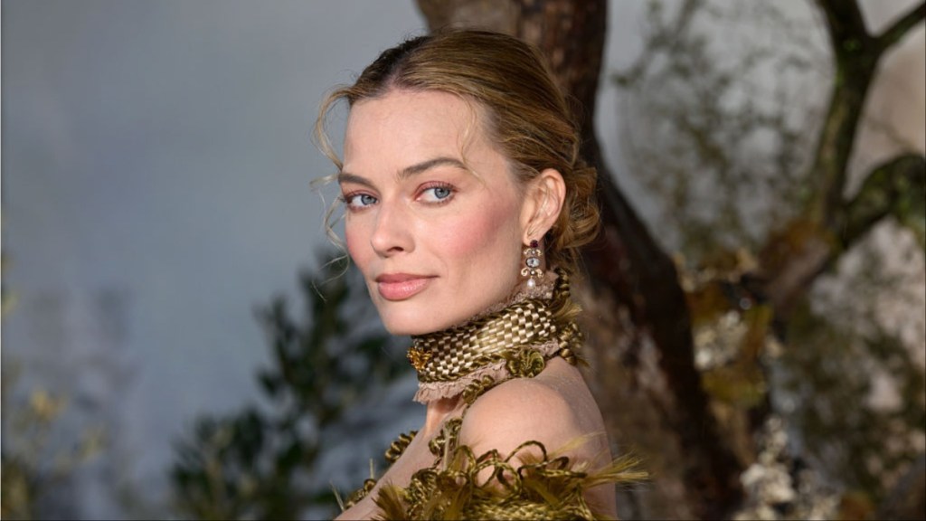 Margot Robbie Makes a Splash in Daring Swimsuit Look for Chanel Campaign