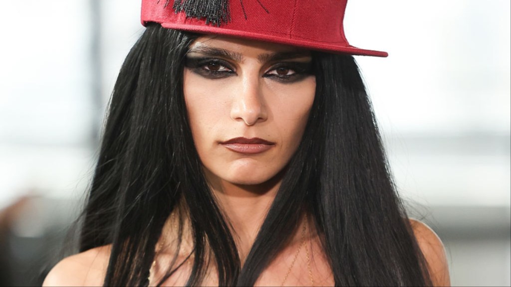 Mia Khalifa Balances a Risky Top With a Sky-High Slit Skirt Moment