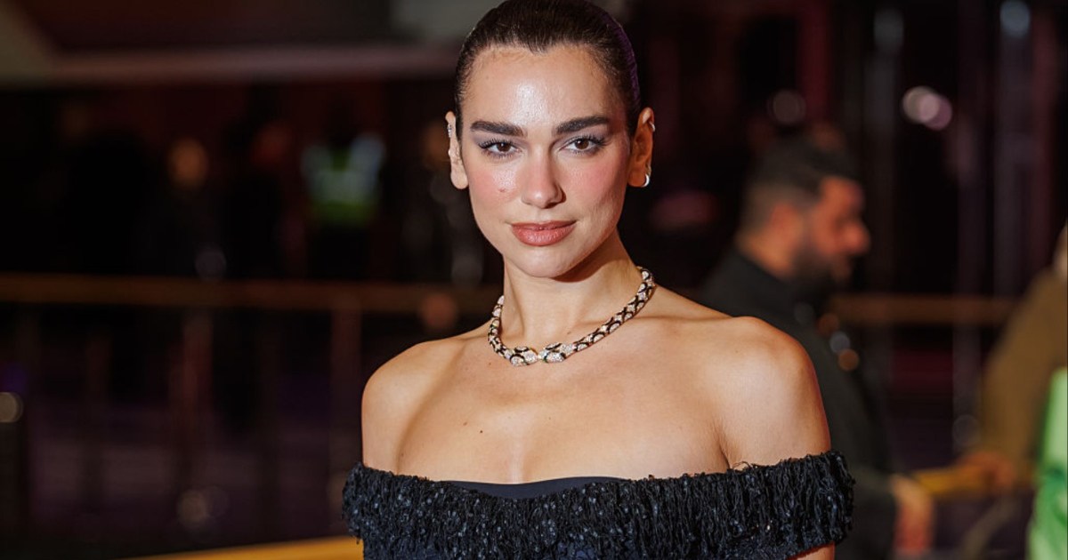 Dua Lipa Takes Over NYC in See-Through Balmain Dress With Daring Cutout