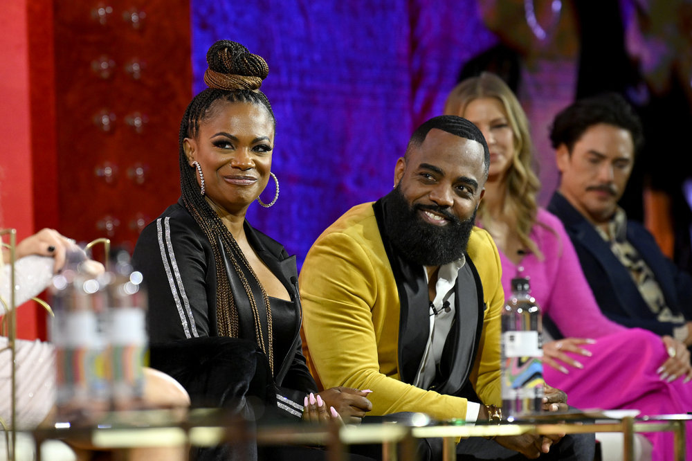 Kandi Burruss and Todd Tucker on stage at BravoCon 2022