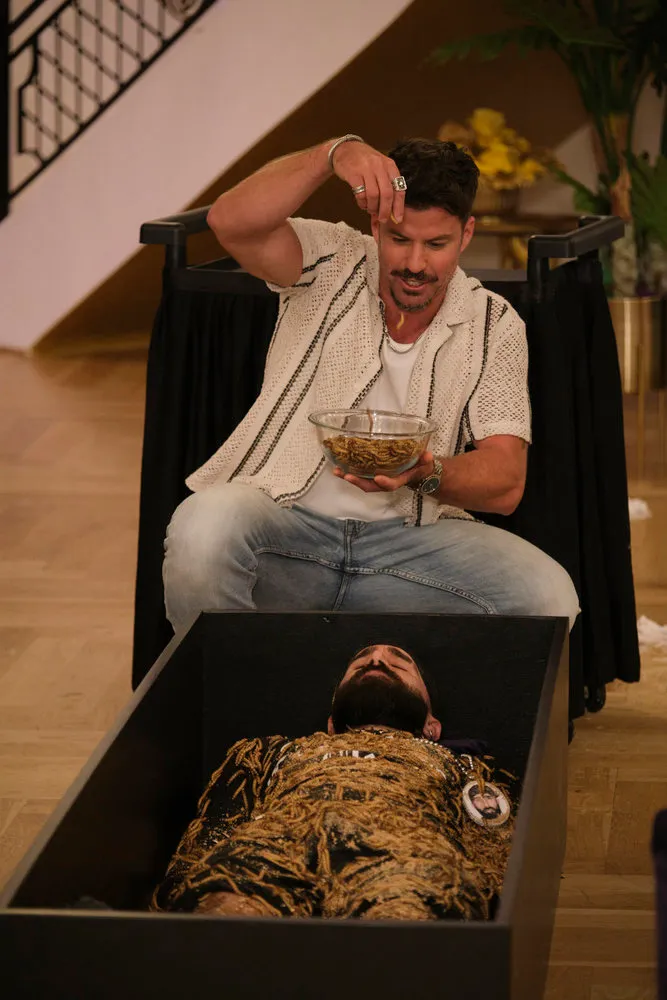 Johnny Bananas sprinkling worms on Paul Abrahamian on House of Villains Season 3