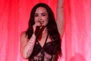 Demi Lovato’s Fully Sheer Micro Minidress Dominates Her Performance