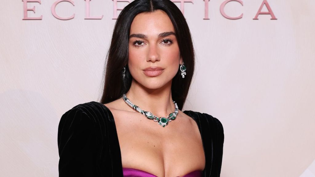 Dua Lipa Exudes Glamor in Balmain Dress With Super High Slit