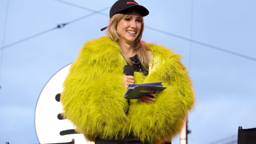 Suki Waterhouse Models Cropped Fur Coat Look for BTS X Spotify Event 