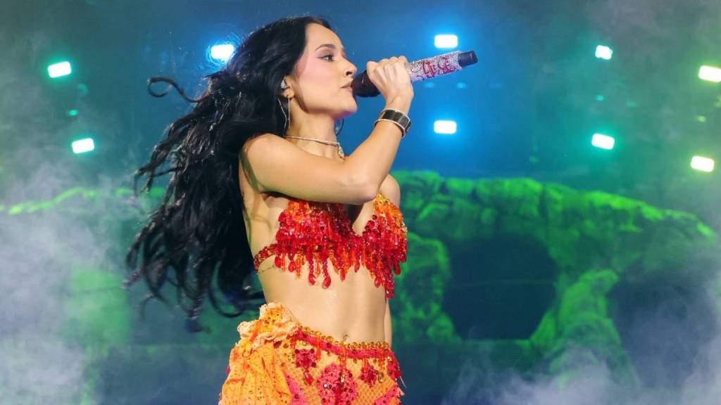 Becky G Boldly Pairs L.O.C.A. Bikini Top With Fully See-Through Pants