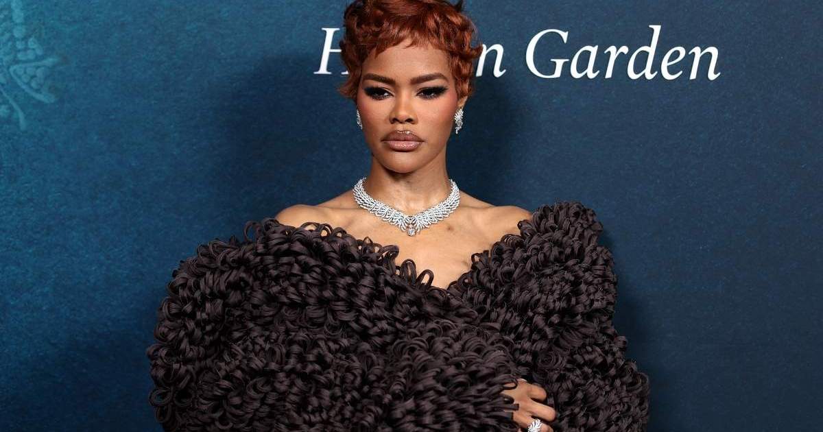 Teyana Taylor's Textured Calvin Klein Coat Pulls Double Duty as Bold Dress