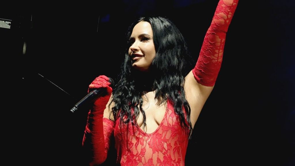 Demi Lovato's Bold Neckline Sheer Bodysuit Look Steals Her Concert's Thunder