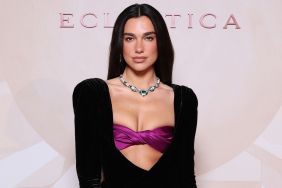 Dua Lipa Nails Peekaboo Trend in Gucci Jacket Literally Held With Button