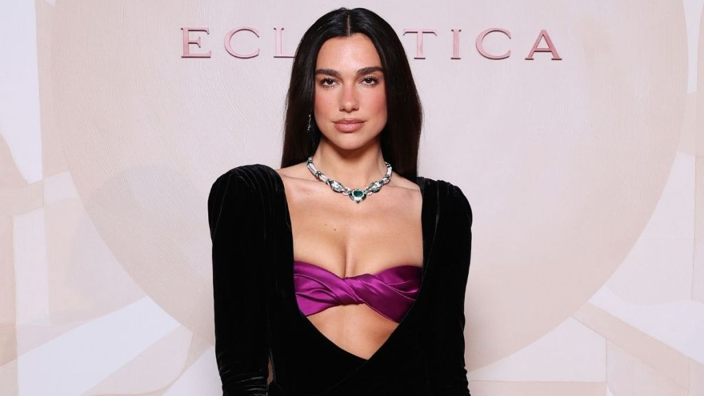 Dua Lipa Nails Peekaboo Trend in Gucci Jacket Literally Held With Button