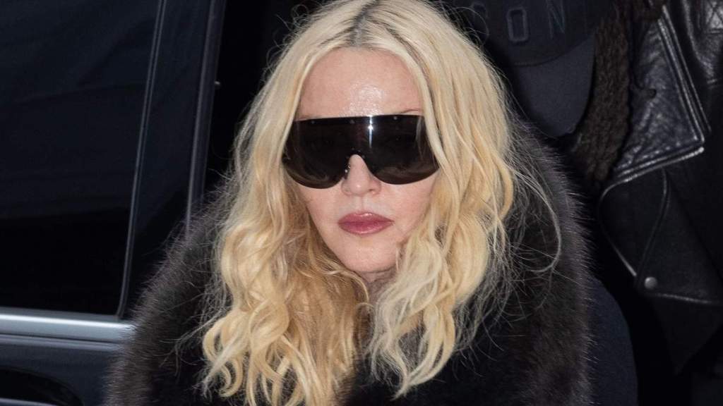 Madonna Pairs Daring Bodysuit With Vintage Gucci Bomber Jacket